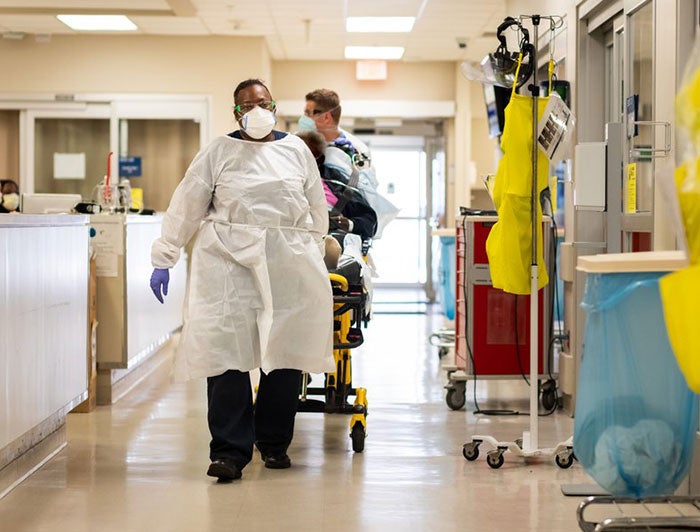 Person rolled in hallway of hospital emergency department