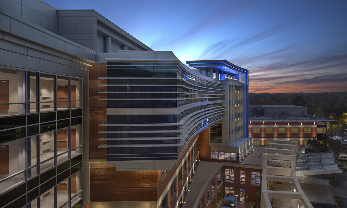 A two-story vertical expansion was added to the existing hospital for a total of six floors. The new addition includes new medical-surgical patient units, along with reimagined patient rooms and caregiver support areas.