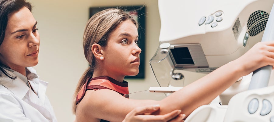 young patient touching machine