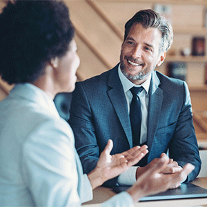 Man and woman talking to each other about sustainability Financing