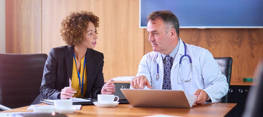 Businesswoman Meeting with a Physician